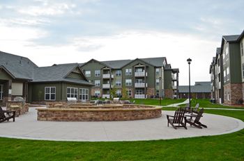 Open air dining space with gas grilling areas & fire pit